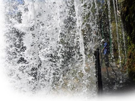 Man in Waterfalls ~ Photo by Patrice